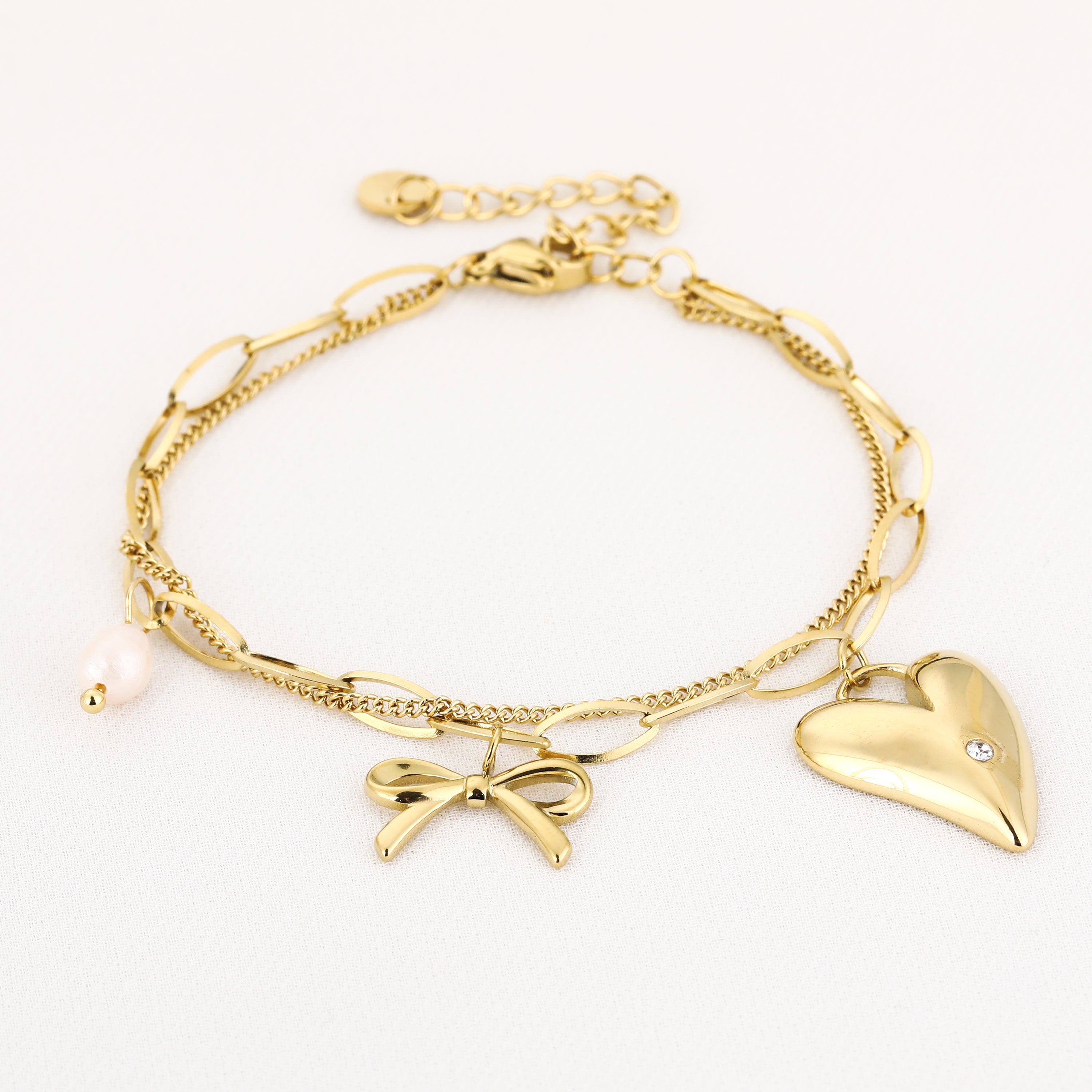 Dubbele armband met parel en bedels