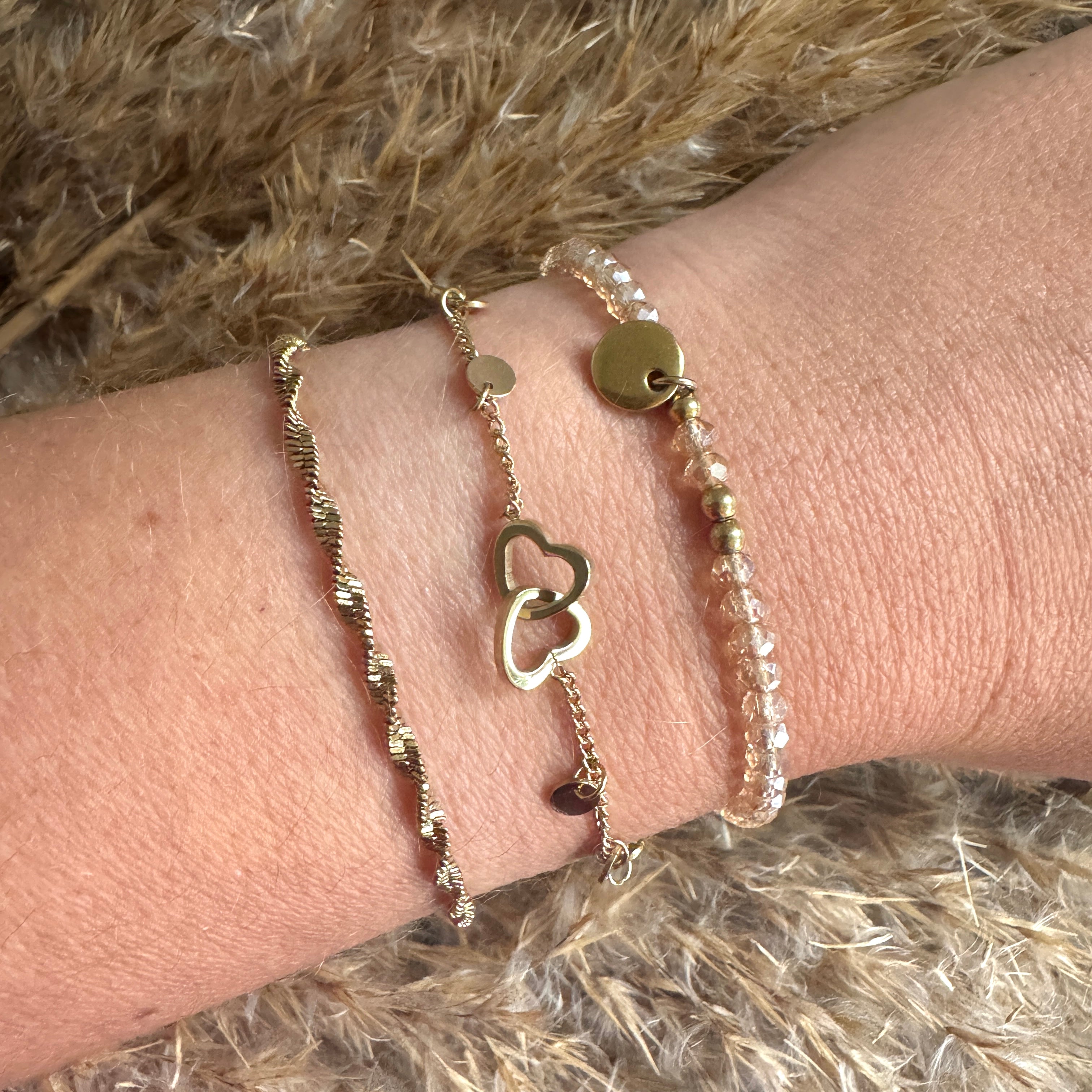 Dubbele hartjes en bolletjes armband