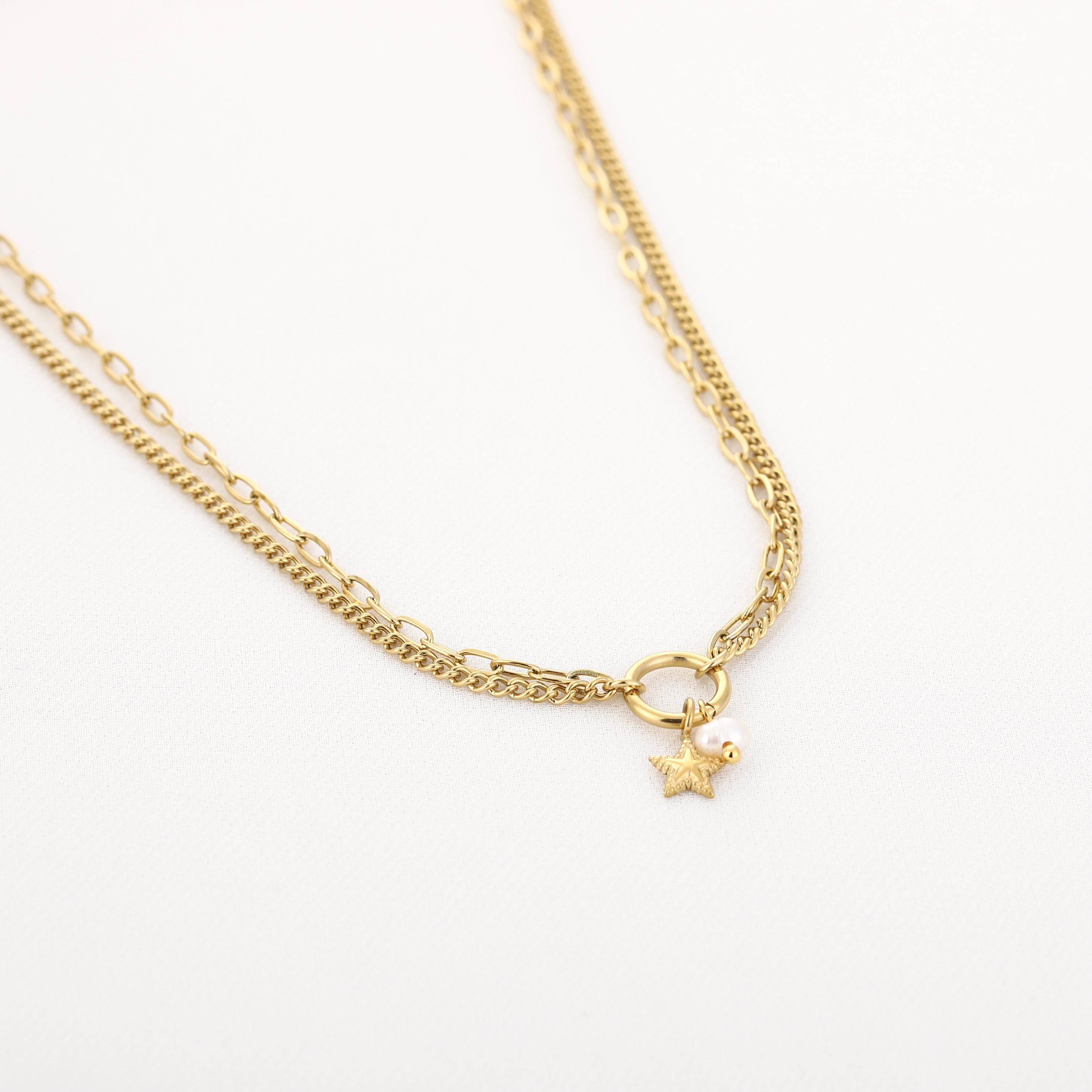 Dubbele ketting met parel en sterretje