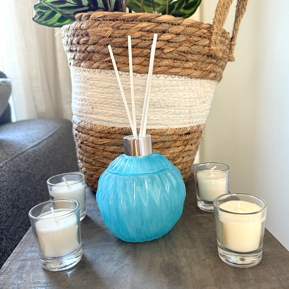 Blauwe geurstokjes houder