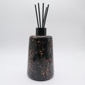 Geurstokjes houder rond zwart marmer look