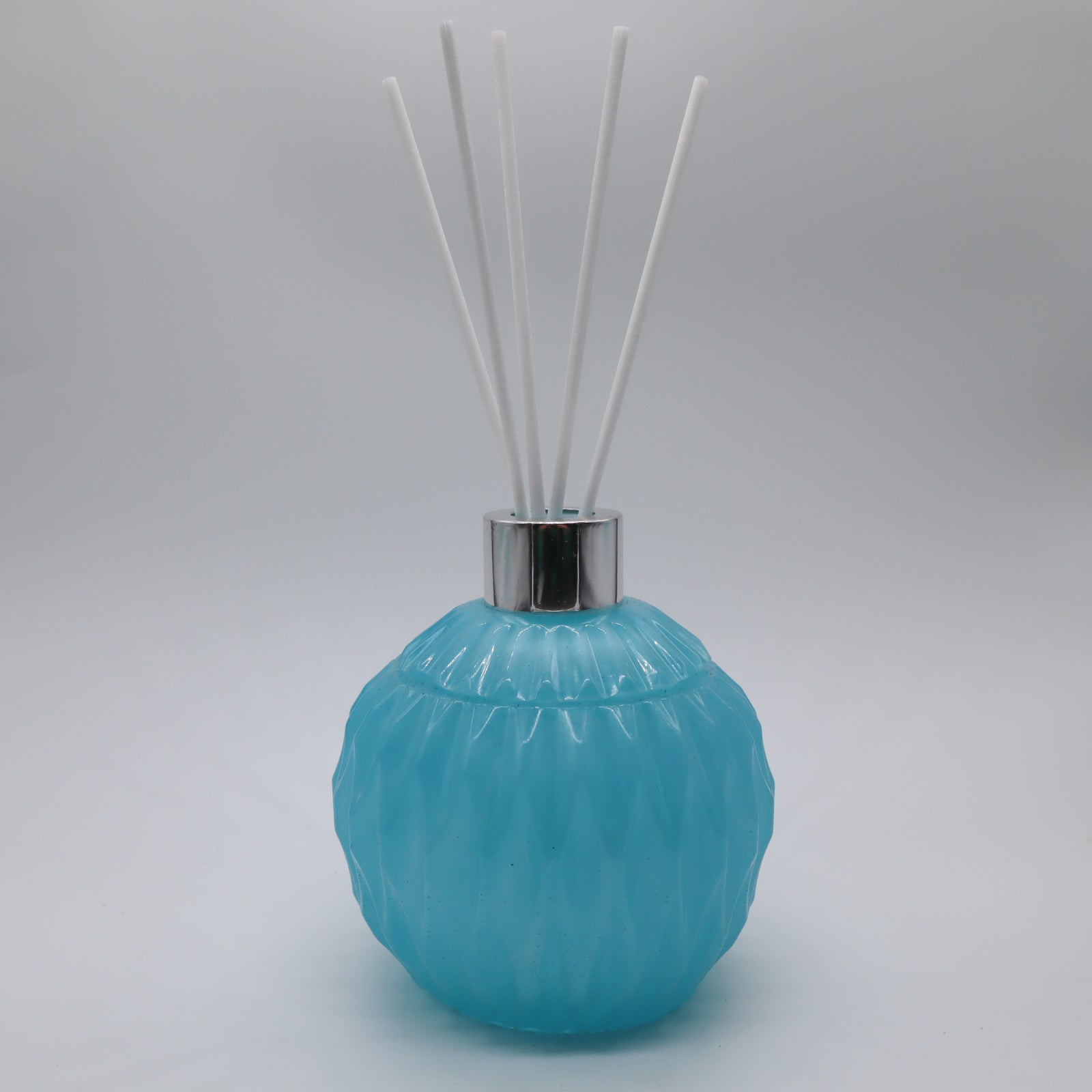 Blauwe geurstokjes houder