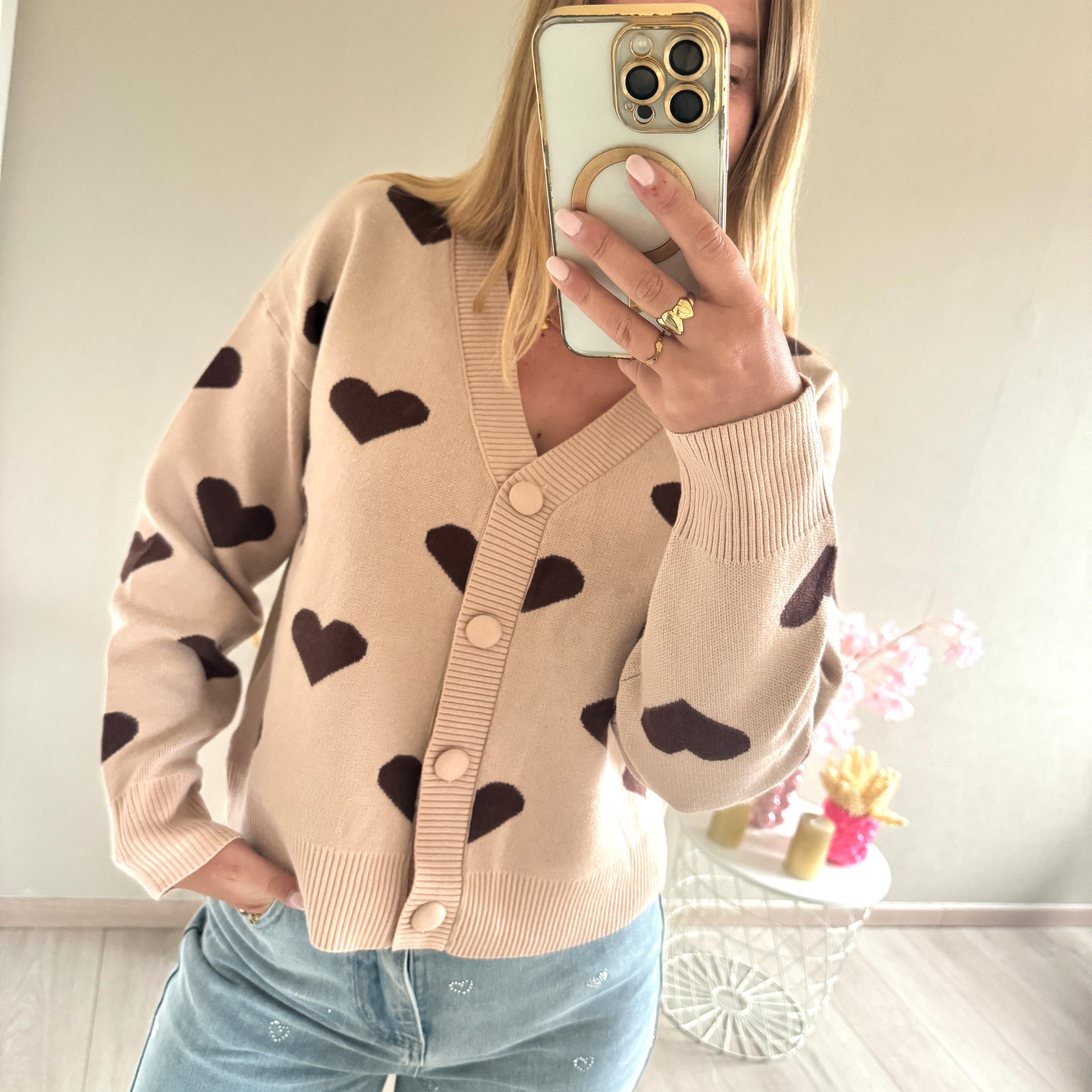 Vestje met hartjes patroon creme