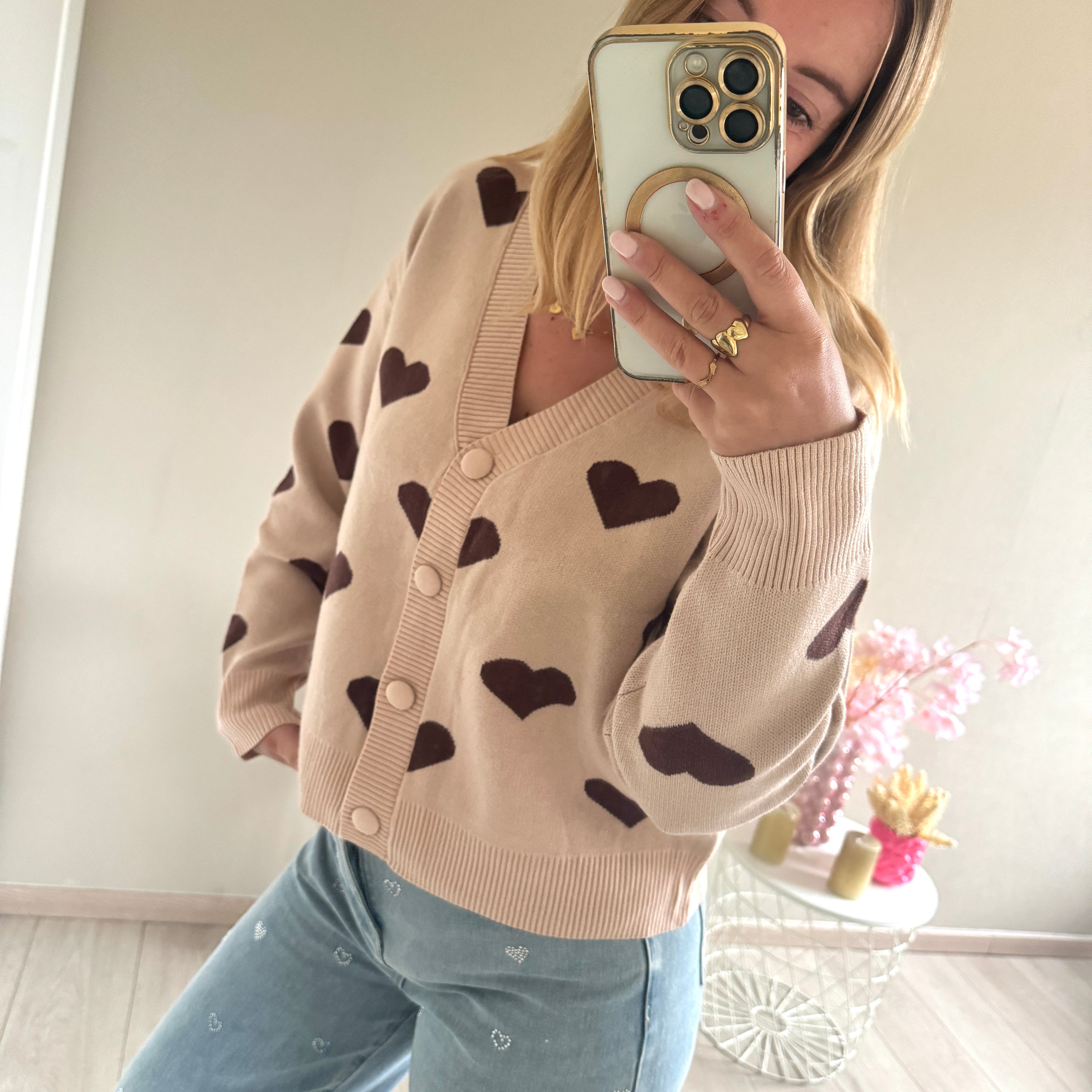 Vestje met hartjes patroon creme