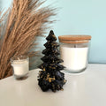 Kerstboom zwart met goudvlokken
