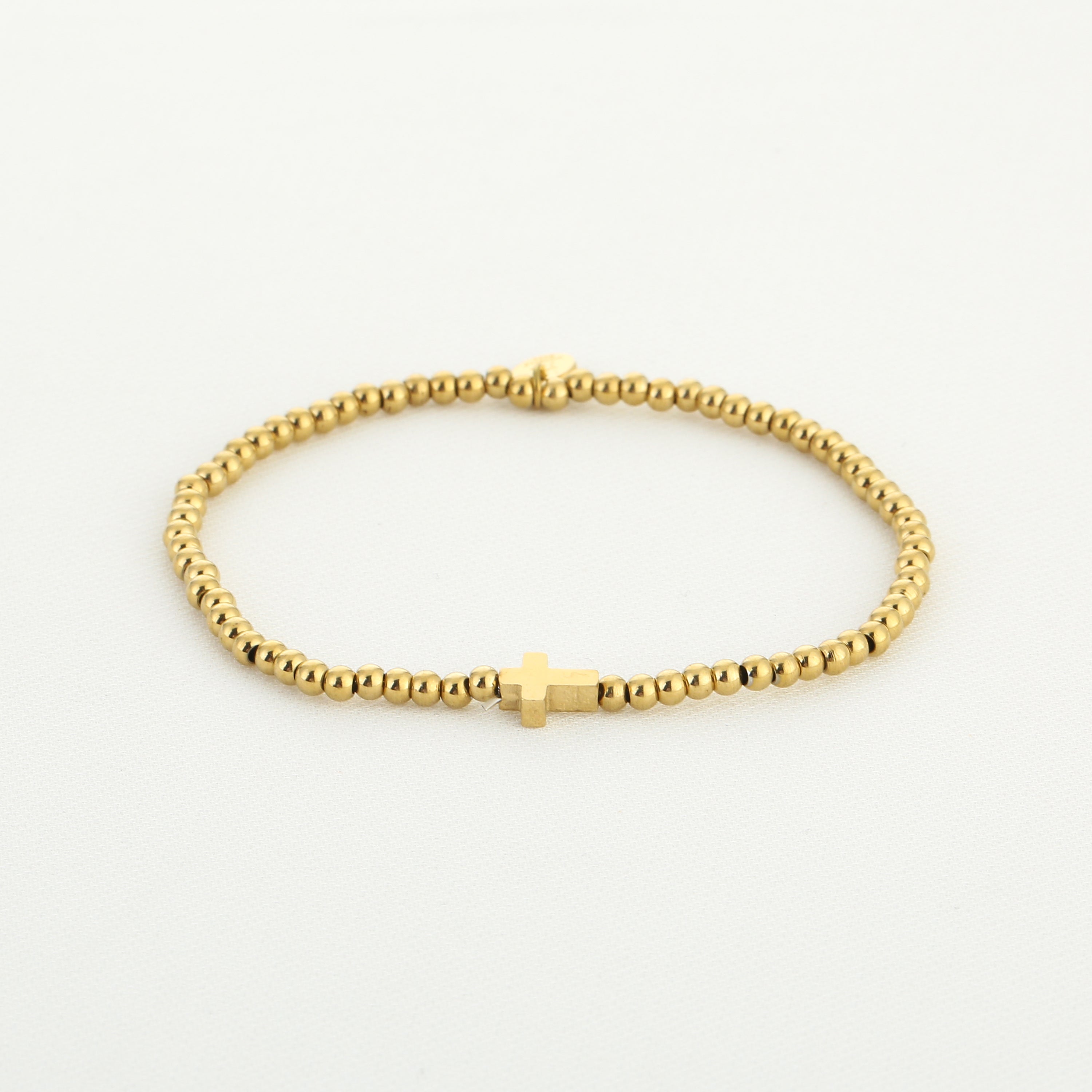 Perlenarmband mit Kreuz
