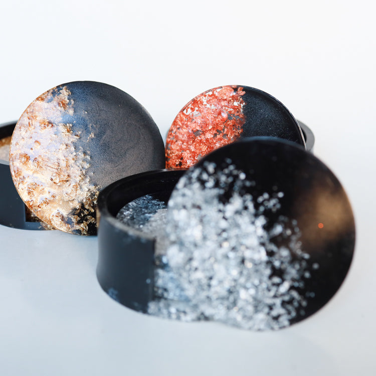 Zwart met vlokken onderzetters met houder