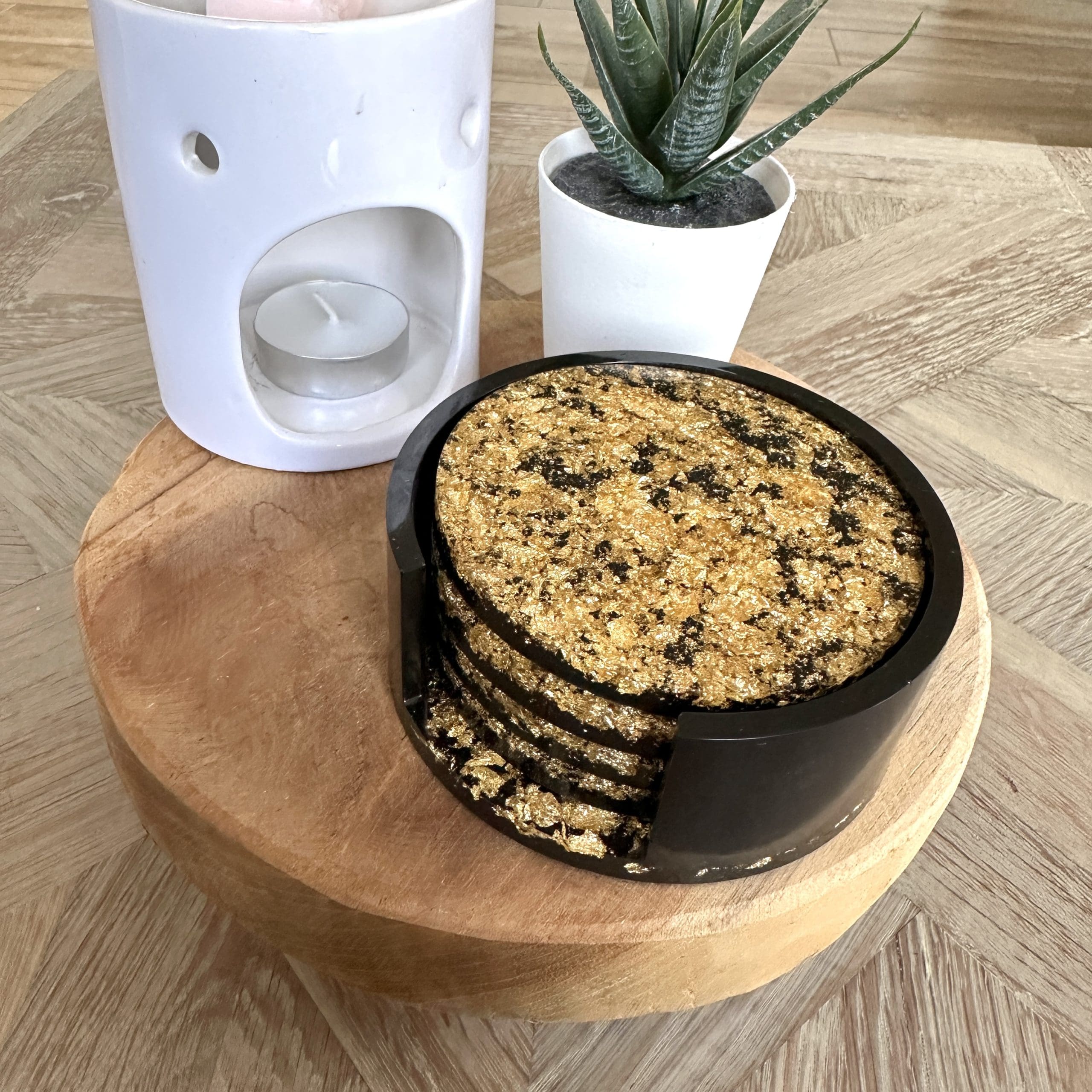 Zwart met vlokken onderzetters in houder