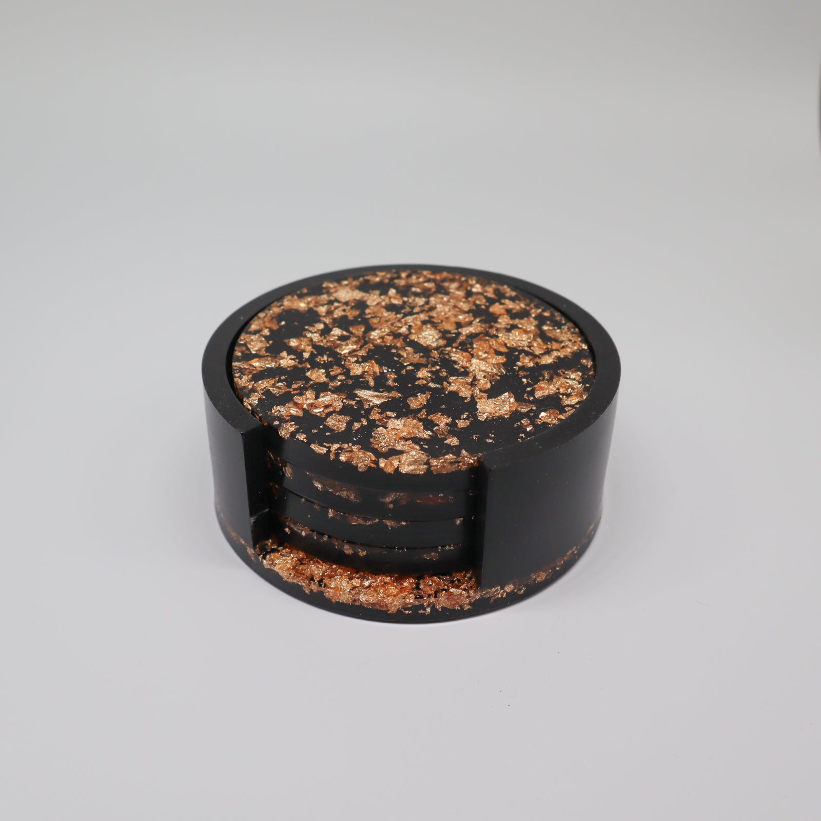 Zwart met vlokken onderzetters in houder