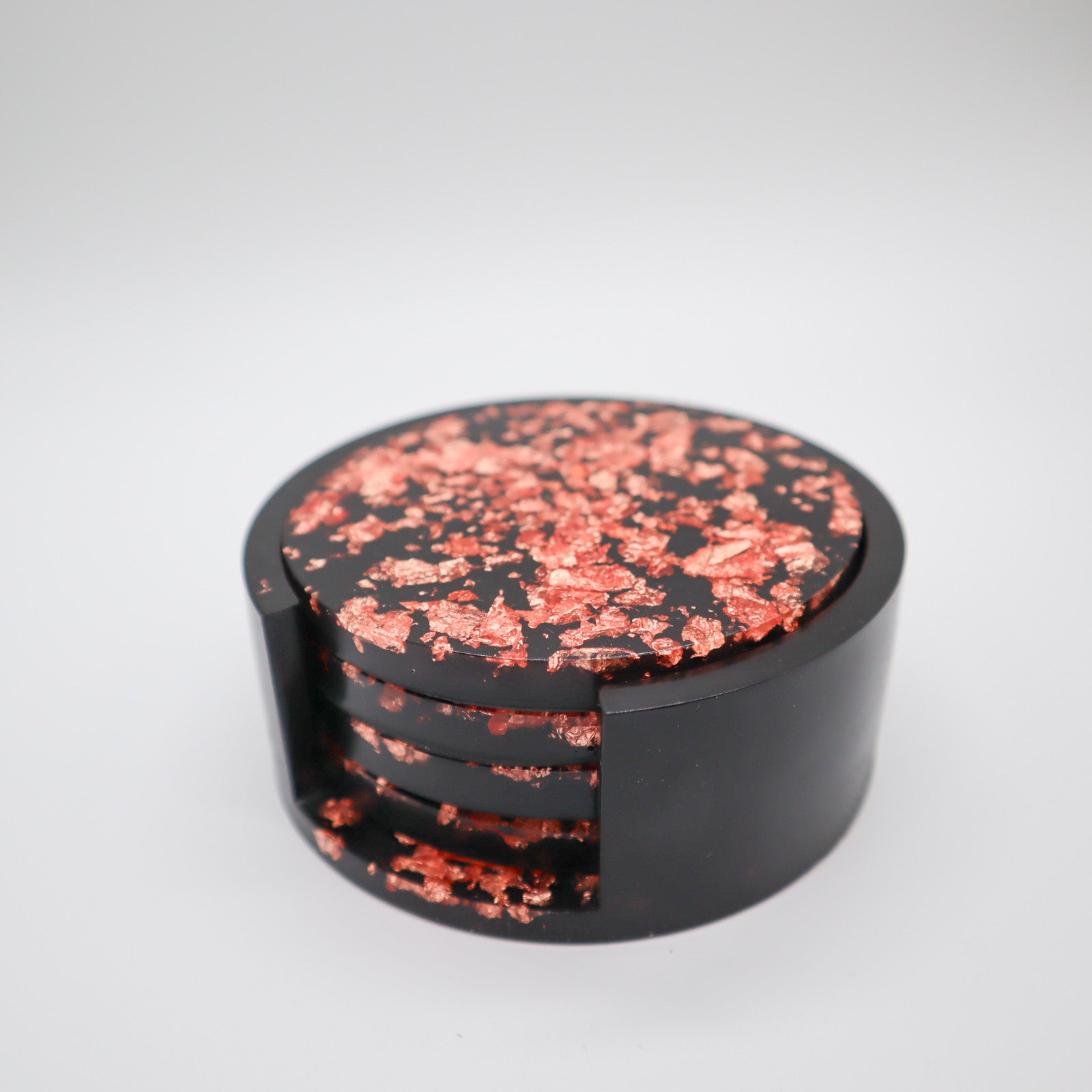 Zwart met vlokken onderzetters in houder