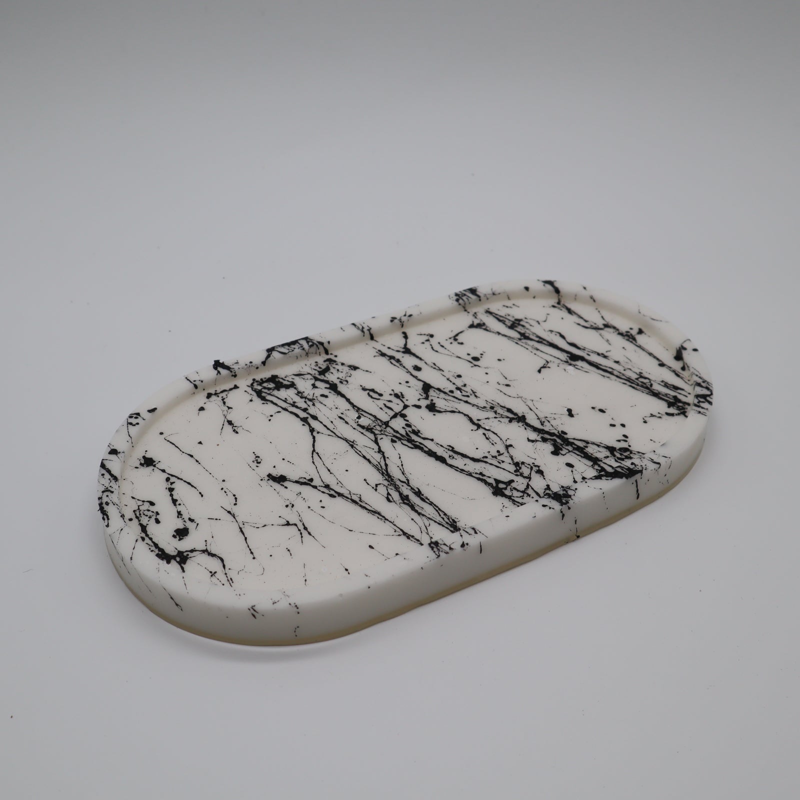 Kleines schwarzes Marmorplateau