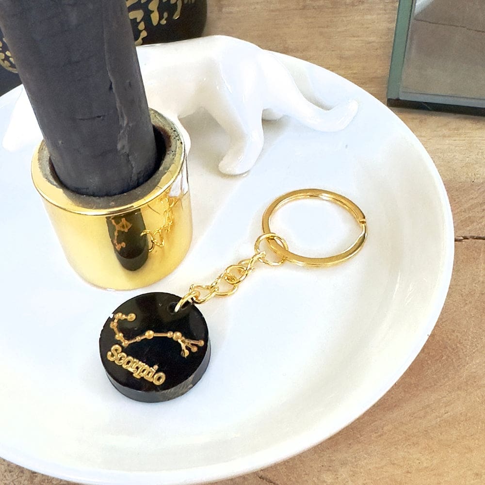 Schwarzer Sternzeichen-Schlüsselanhänger